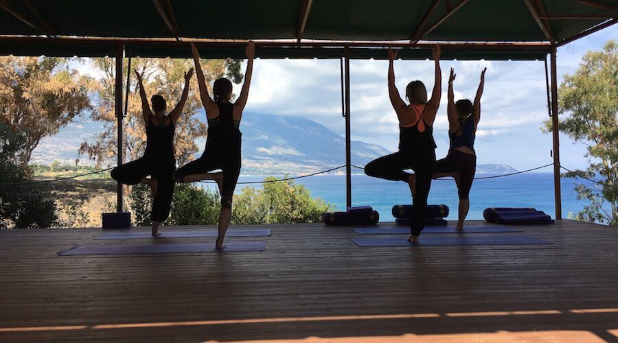 Practicing yoga with a nice ocean view